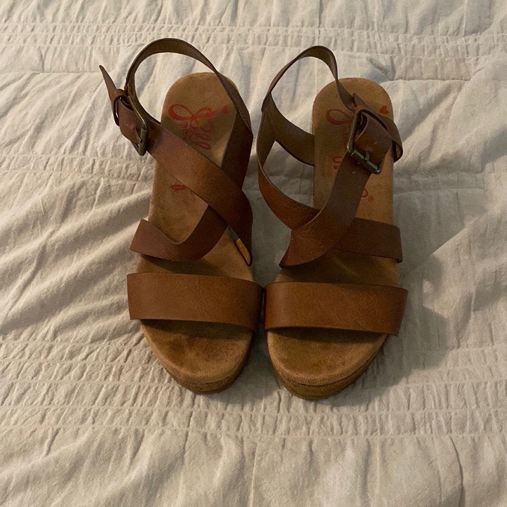 Size 7 brown wedges. Great condition.